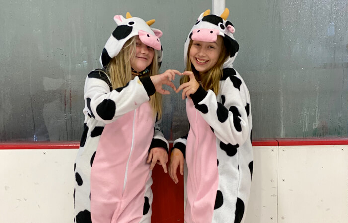 girls dressed as cows